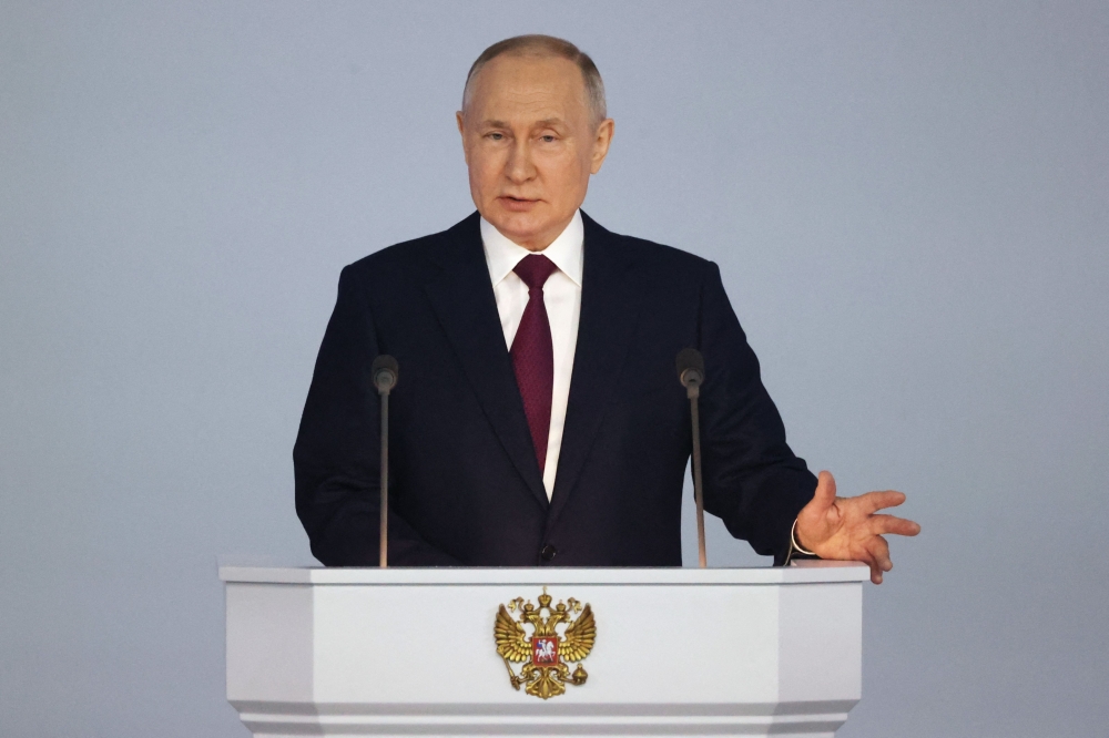 Russian President Vladimir Putin delivers his annual state of the nation address at the Gostiny Dvor conference centre in central Moscow on February 21, 2023. (Photo by Sergei Karpukhin / AFP)