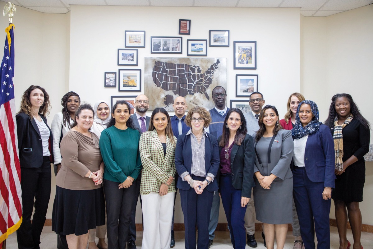 US Assistant Secretary of State for Consular Affairs Rena Bitter (centre) with US Embassy Doha Consular Section staff.
