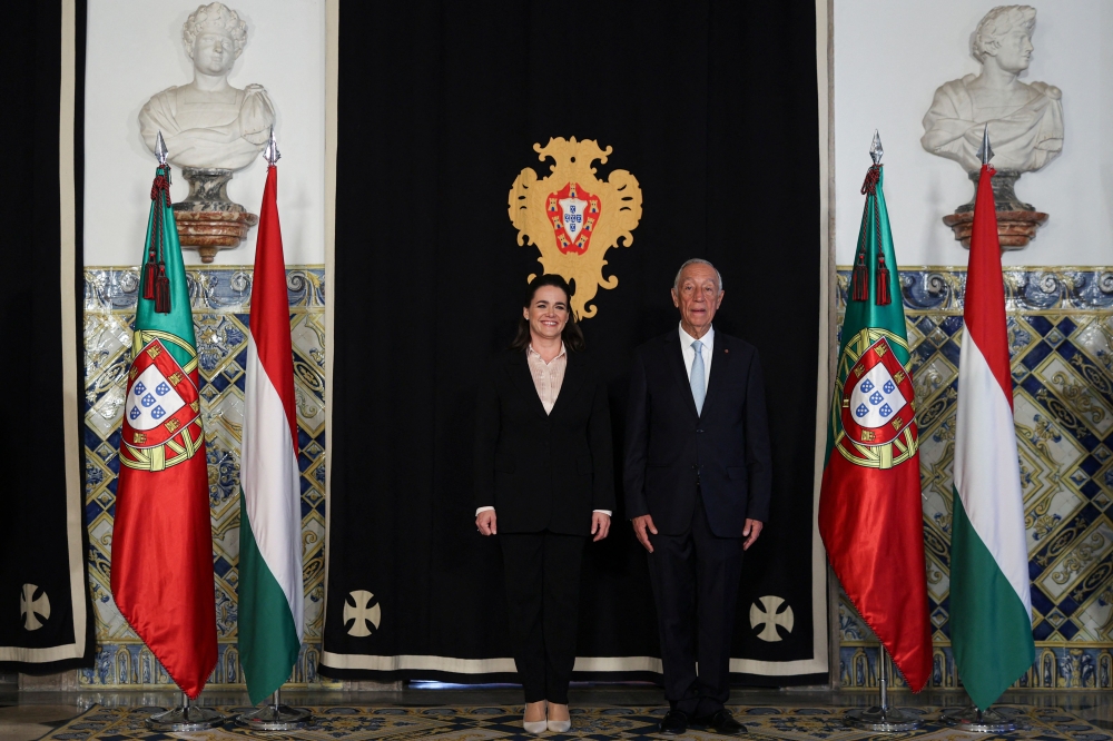 Hungarian President Katalin Novak (left) and Portuguese President Marcelo Rebelo de Sousa pose at the Belem Palace in Lisbon on February 23, 2023. (Photo by FILIPE AMORIM / AFP)