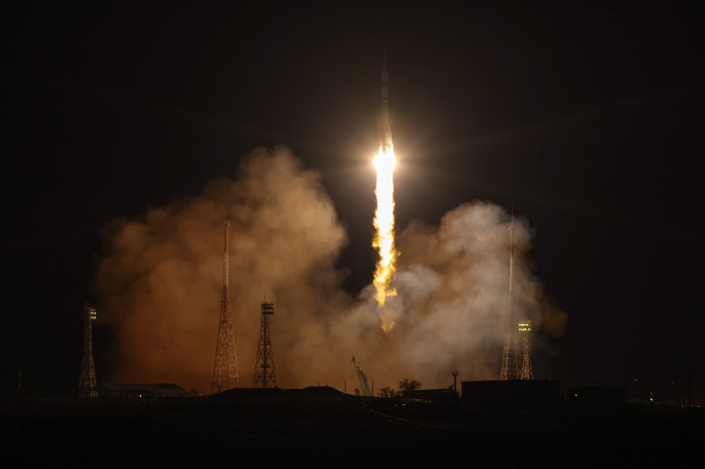 This handout picture taken and released by the Russian space agency Roscosmos shows the unmanned Soyuz MS-23 replacement spacecraft taking off to the International Space Station (ISS) from the Baikonur Cosmodrome in Kazakhstan on February 24, 2023. (AFP)