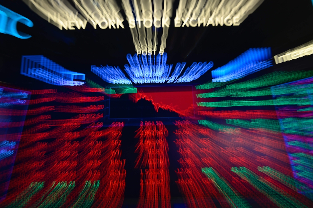 A screen shows the numbers after closing bell at the New York Stock Exchange NYSE on September 27, 2019 at Wall Street. AFP / Johannes Eisele

