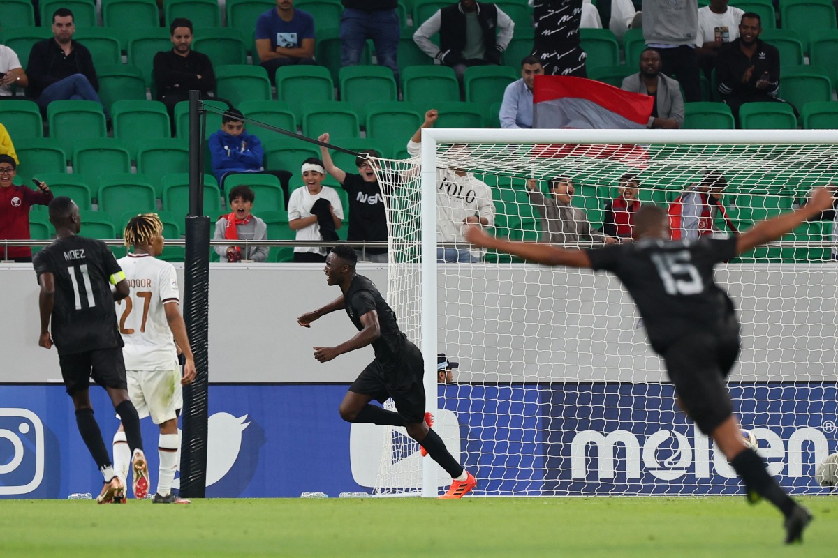 Michael Olunga celebrates after scoring Al Duhail's second goal during the AFC Champions League quarter-final match against Saudi Arabia’s Al Shabab at Al Thumama Stadium on Thursday. AFP