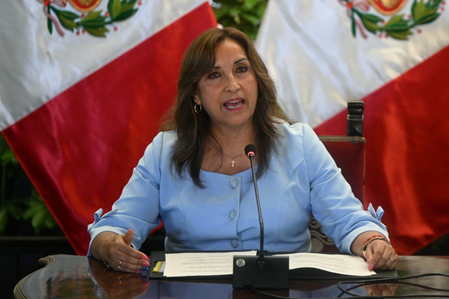 In this file photo taken on February 10, 2023, Peru’s President Dina Boluarte speaks during a press conference at the Presidential Palace in Lima.  (Photo by ERNESTO BENAVIDES / AFP)
