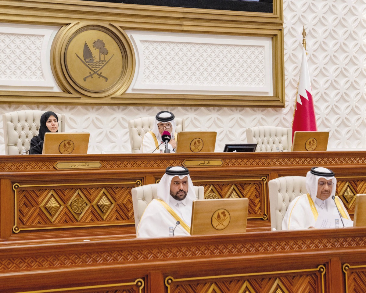 Speaker of the Shura Council H E Hassan bin Abdullah Al Ghanim (top right) chairing the regular weekly meeting yesterday.