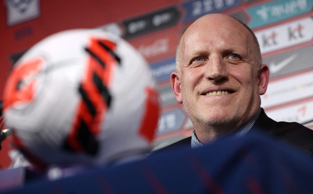 This photo taken on February 28, 2023 shows Michael Muller, chairman of the National Team Committee of the Korea Football Association (KFA), holding a press conference following the appointment of Germany's Jurgen Klinsmann as the new head coach of South Korea's national football team in Seoul. (Photo by yonhap / YONHAP / AFP) 