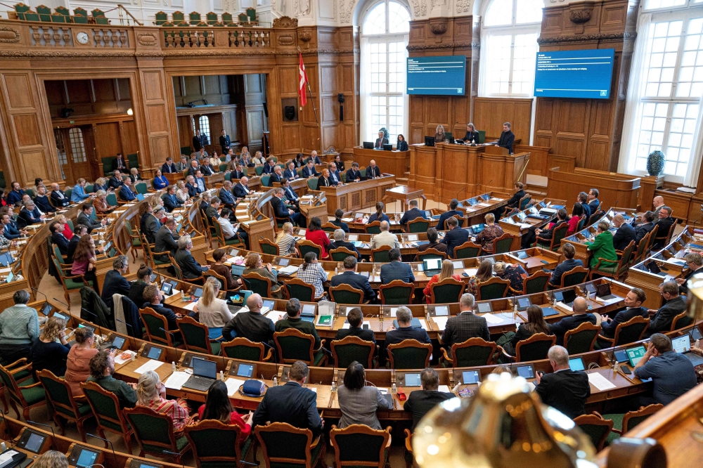 A general view taken on February 28, 2023 show members of the Danish parliament attending a session before a vote at the Folketing at Christiansborg in Copenhagen. - A majority in the Folketing has on February 28 decided to transform Great Prayer Day into a working day from next year after a short but intense debate in recent months. (Photo by Liselotte Sabroe / Ritzau Scanpix / AFP) 