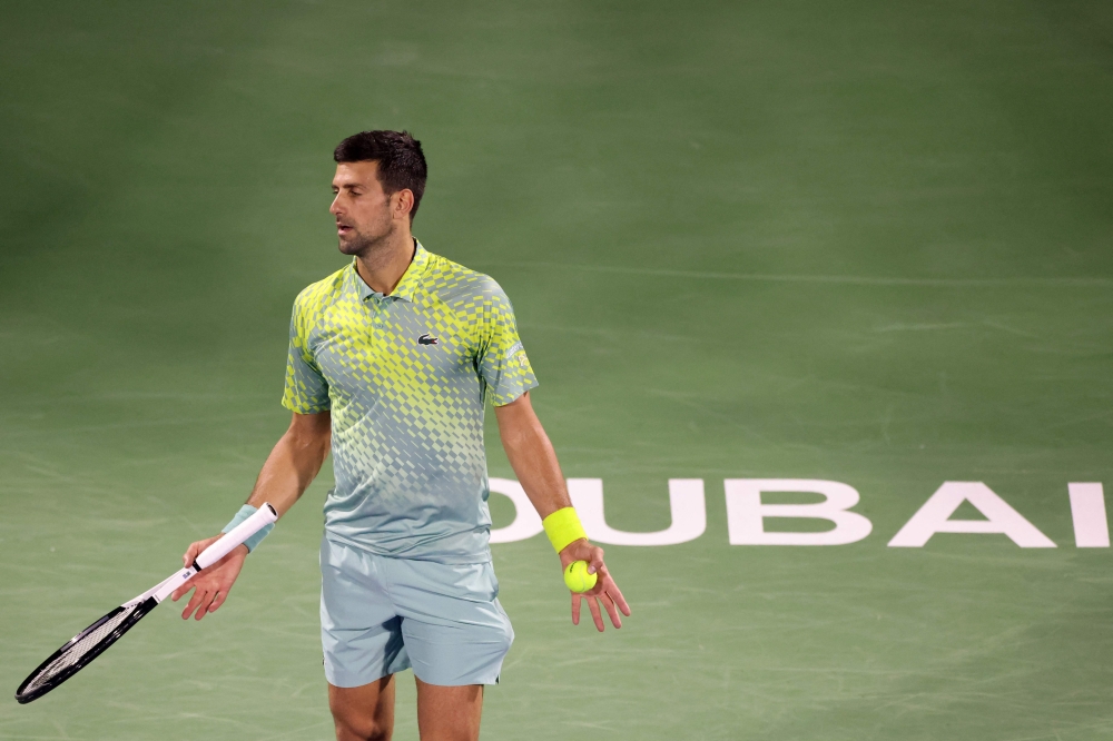 Serbia's Novak Djokovic reacts during his Dubai Duty Free Tennis Championship match against Netherlands' Tallon Griekspoor in Dubai on March 1, 2023. (Photo by Karim SAHIB / AFP)