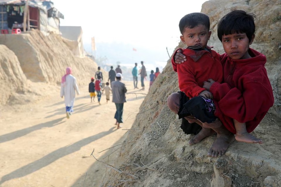File Photo: Rohingya refugee children look on at the Jamtoli camp in the morning in Cox's Bazar, Bangladesh, January 22, 2018. (REUTERS/Mohammad Ponir Hossain)