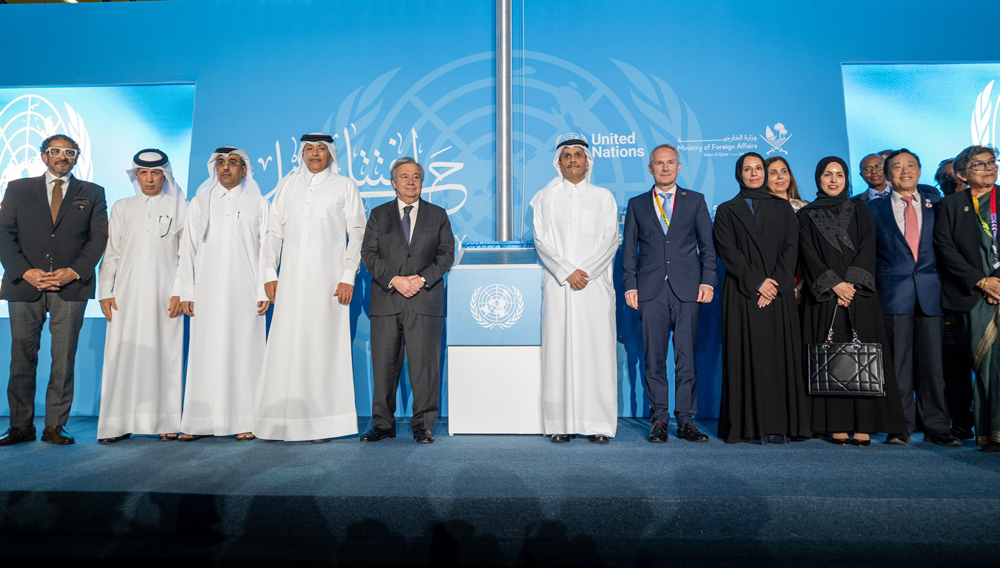 Speaker of the Shura Council H E Hassan bin Abdullah Al Ghanim (fourth left); Deputy Prime Minister and Minister of Foreign Affairs H E Sheikh Mohammed bin Abdulrahman Al Thani (sixth left); Secretary-General of the United Nations H E Antonio Guterres (fifth left) and Their Excellencies the Ministers and other officials during the opening of the UN House in Lusail, yesterday.
