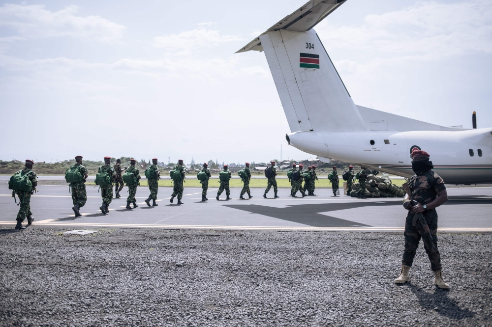 Burundian military personnel arrive at Goma airport in eastern Democratic Republic of Congo on March 5, 2023. (Photo by ALEXIS HUGUET / AFP)