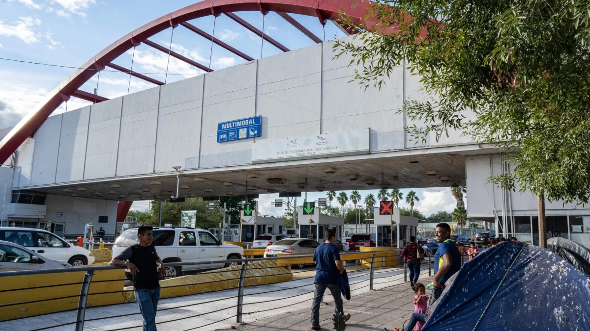 The Gateway International Bridge is seen with migrants waiting close to the border check point with the United States, in Matamoros, Tamaulipas state, Mexico, on November 5, 2019. File photo / AFP
