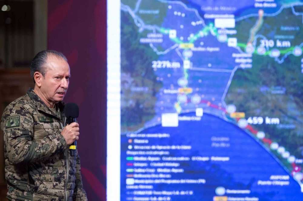 Handout picture released by the Mexican Presidency showing the Secretary of the Mexican Navy, Jose Rafael Ojeda, speaking during a press conference on the kidnapping of four US citizens, two who have been killed, in the border city of Matamoros, State of Tamaulipas, at the National Palace in Mexico City, on March 7, 2023 (Photo by Mexican Presidency / AFP)