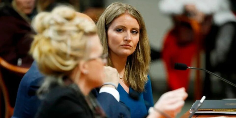 Lawyer Jenna Ellis, right, listens to Melissa Carone, who was working for Dominion Voting Services, as she speaks in front of the Michigan House Oversight Committee in Lansing, Mich., on December 2, 2020.Jeff Kowalsky/AFP via Getty Images
