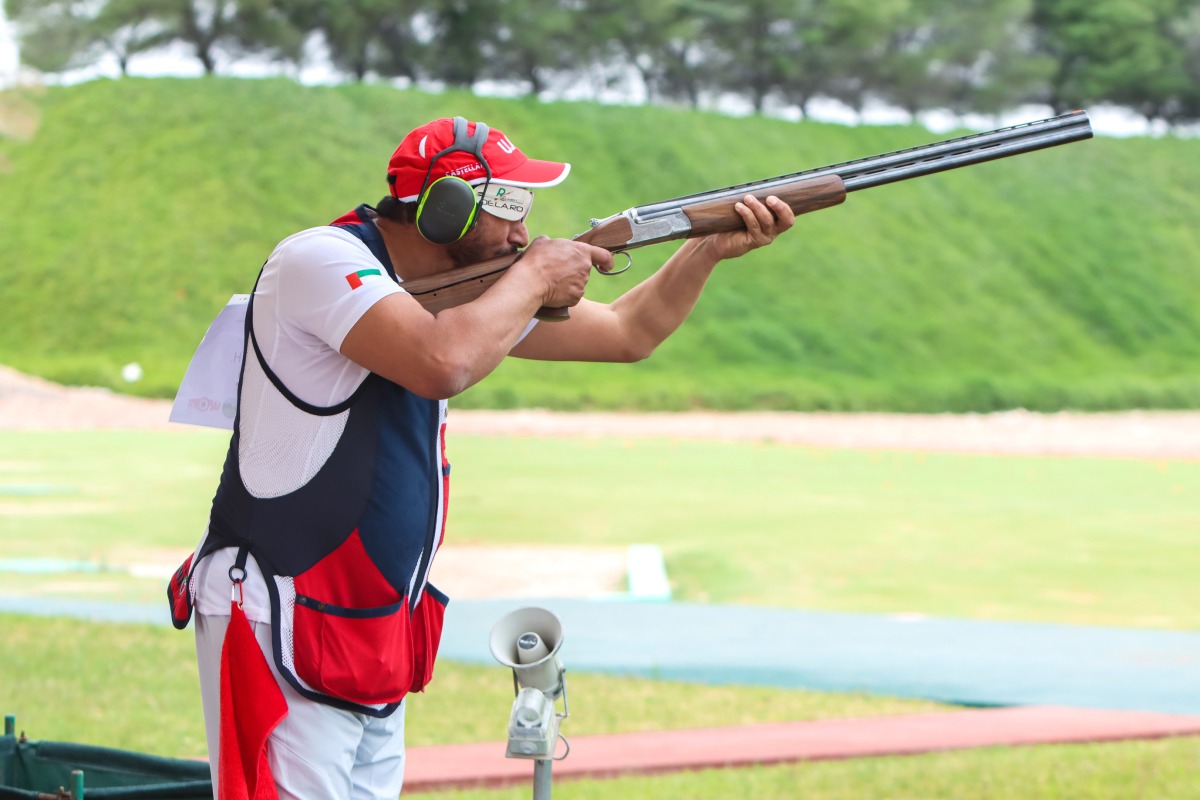 Shooters in action during yesterday's qualifying round of men's trap.
