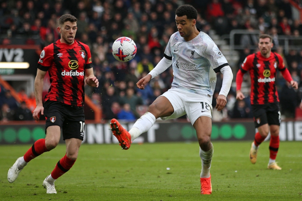 Liverpool's Dutch striker Cody Gakpo (centre) controls the ball during the English Premier League football match between Bournemouth and Liverpool at the Vitality Stadium in Bournemouth, southern England on March 11, 2023. (Photo by Steve Bardens / AFP) 