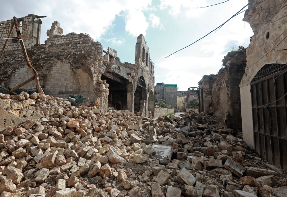 This file photo taken on February 7, 2023, shows rubble in Aleppo's old town on following a deadly earthquake. (Photo by Louai Beshara / AFP)