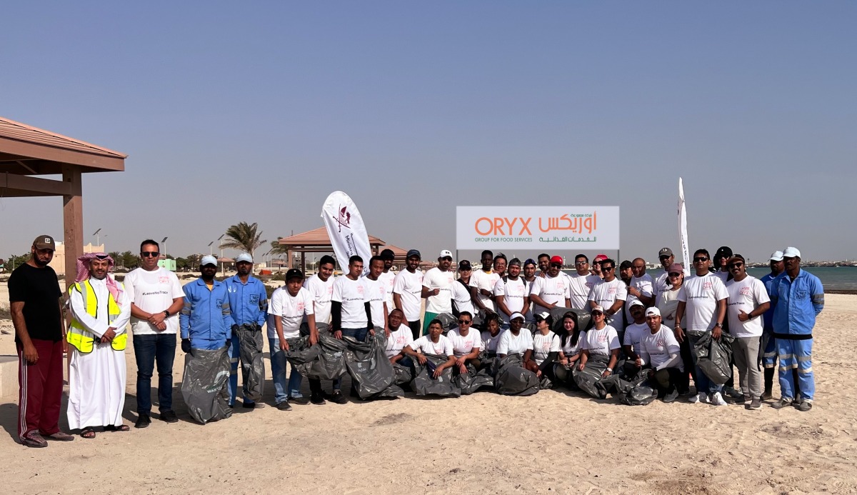The Oryx Group officials pose for a photograph during the program.