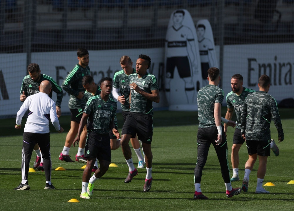 Real Madrid's players attend a training session on March 14, 2023, at the Ciudad Real Madrid training complex in Valdebebas, outskirts of Madrid, on the eve of the UEFA Champions League last 16 second leg football match between Real Madrid CF and Liverpool FC. (Photo by PIERRE-PHILIPPE MARCOU / AFP)