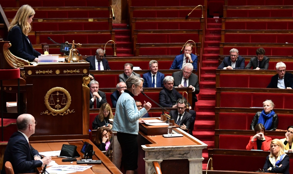French Prime Minister Elisabeth Borne delivers a speech prior to the vote of two motions of no confidence at the French National Assembly, on March 20, 2023.  (Photo by BERTRAND GUAY / AFP)