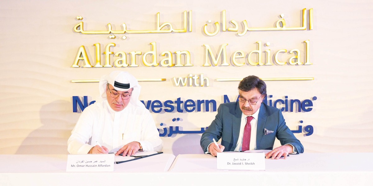 Omar Hussain Alfardan, President and CEO of Alfardan Group, and Dr. Javaid Sheikh, Dean of WCM-Q, signing the agreement.