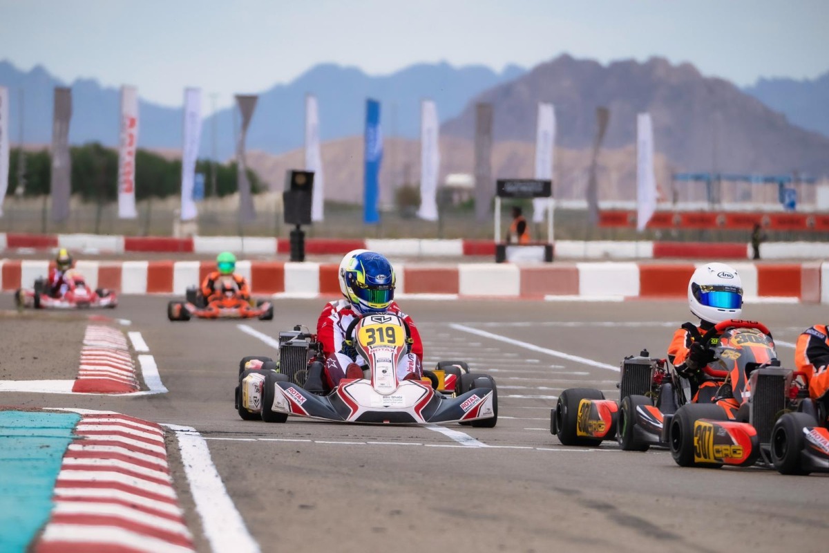  Qatar Motorsport Academy's Taha Hassiba (centre) drives during the UAE Rotax Max Challenge Round 7.2 at Al Ain Raceway.