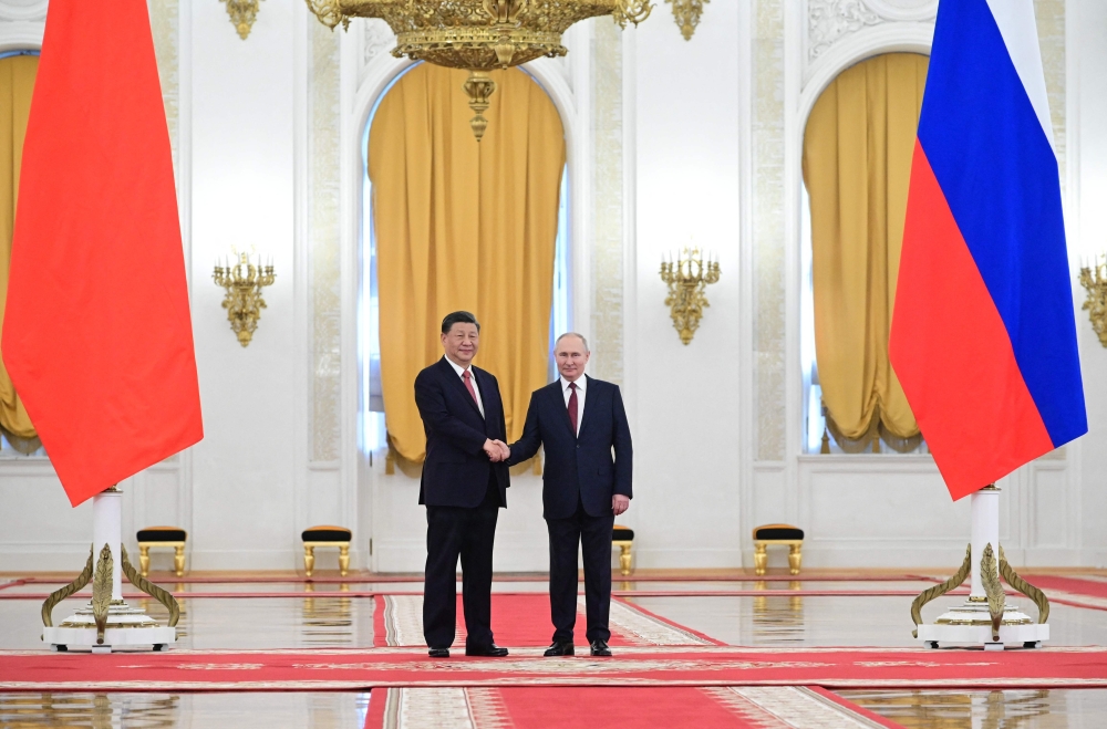Russian President Vladimir Putin meets with China's President Xi Jinping at the Kremlin in Moscow on March 21, 2023. (Photo by Pavel Byrkin / SPUTNIK / AFP)