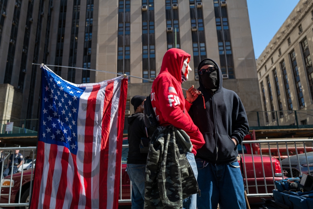 People gather outside of a Manhattan courthouse as the nation waits for the possibility of an indictment against former president Donald Trump by the Manhattan District Attorney Alvin Bragg's office on March 21, 2023 in New York City. Spencer Platt/Getty Images/AFP 