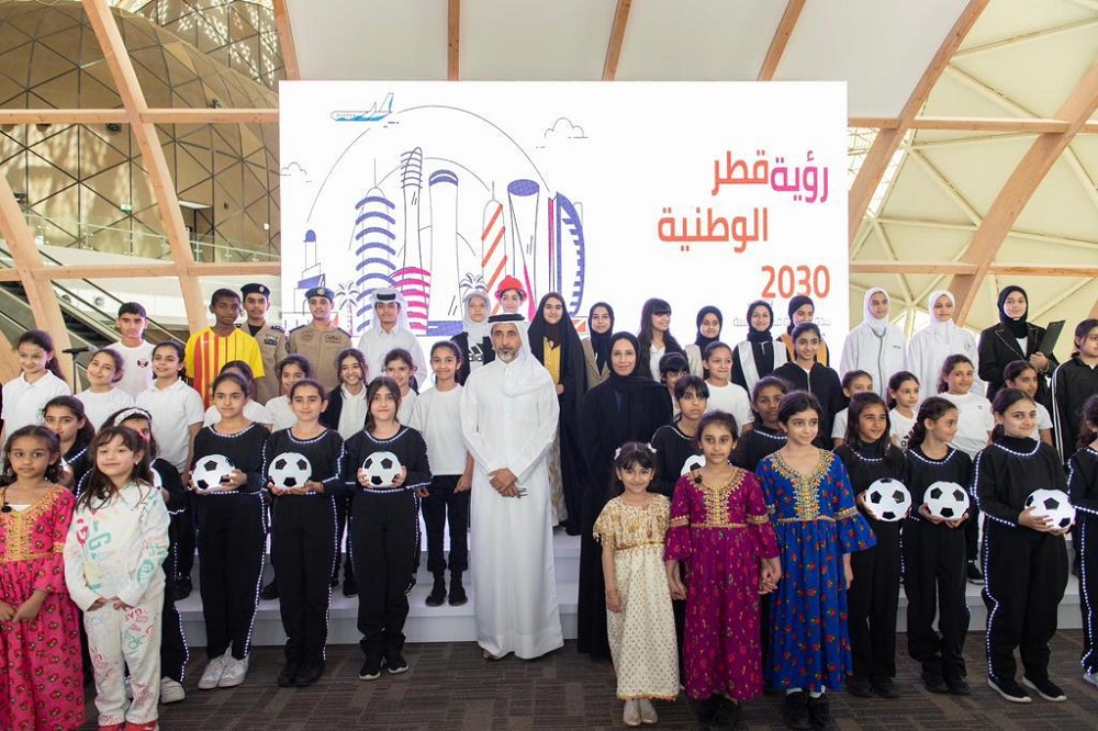Minister of Sports and Youth H E Salah bin Ghanim Al Ali and Minister of Education and Higher Education H E Buthaina bint Ali Al Jabr Al Nuaimi with schoolchildren at the launch of the initiative for cooperation between the two ministries.