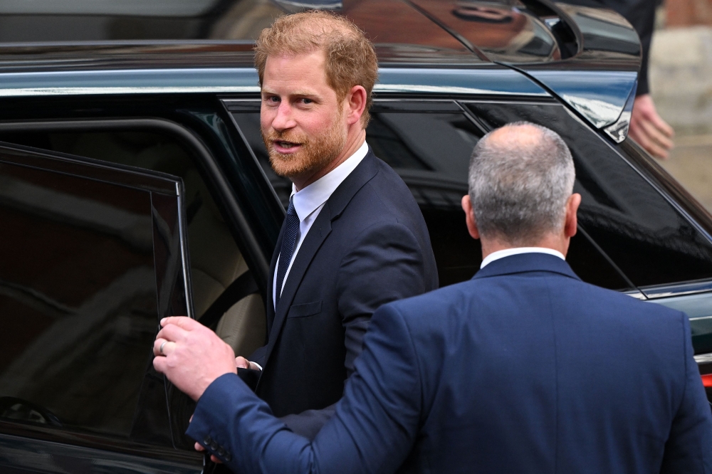 Britain's Prince Harry, Duke of Sussex leaves from the Royal Courts of Justice, Britain's High Court, in central London on March 27, 2023.  (Photo by JUSTIN TALLIS / AFP)