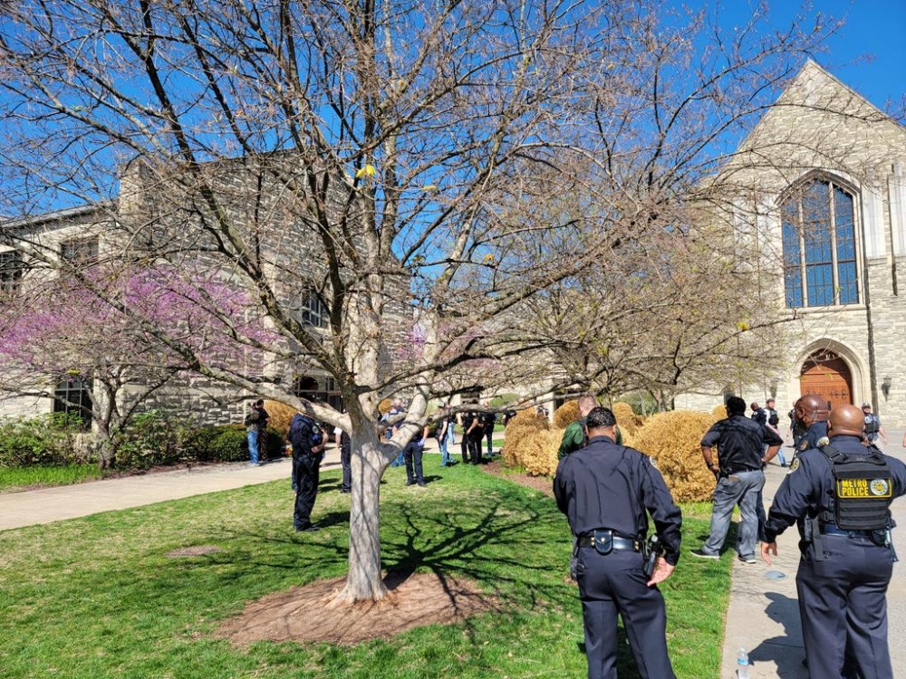 This image released by the Metro Nashville Police Department on their Twitter account on March 27, 2023, shows officers responding to a shooting at Covenant School, Covenant Presbyterian Church, in Nashville, Tennessee.  (Photo by Handout / Metro Nashville Police Department / AFP) 