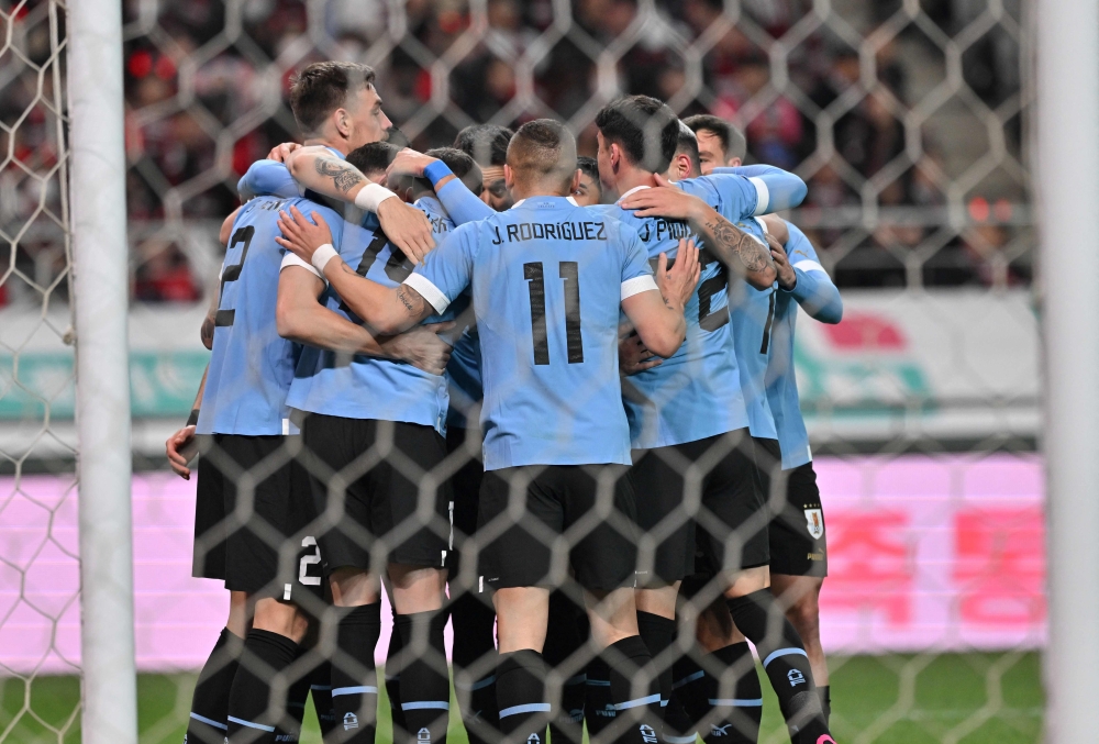 Uruguay's players celebrate a goal by teammate Sebastian Coates Nion against South Korea during a friendly football match between South Korea and Uruguay in Seoul on March 28, 2023. Photo by JUNG YEON-JE / AFP