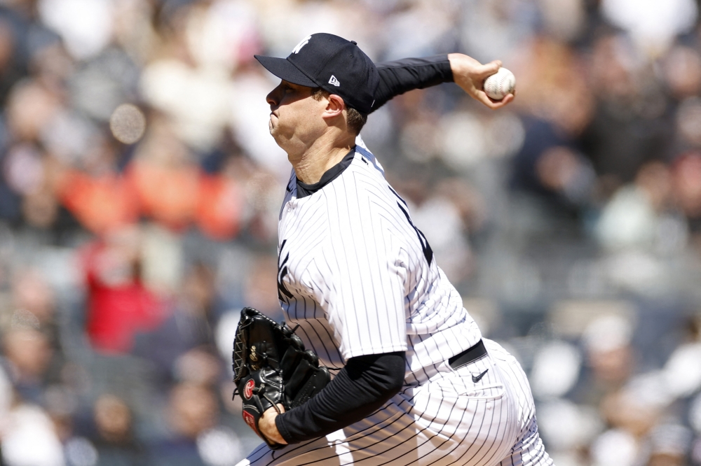 Gerrit Cole #45 of the New York Yankees pitches during the first inning against the San Francisco Giants on Opening Day at Yankee Stadium on March 30, 2023 in the Bronx borough of New York City. Sarah Stier/Getty Images/AFP (Photo by Sarah Stier / GETTY IMAGES NORTH AMERICA / Getty Images via AFP)
