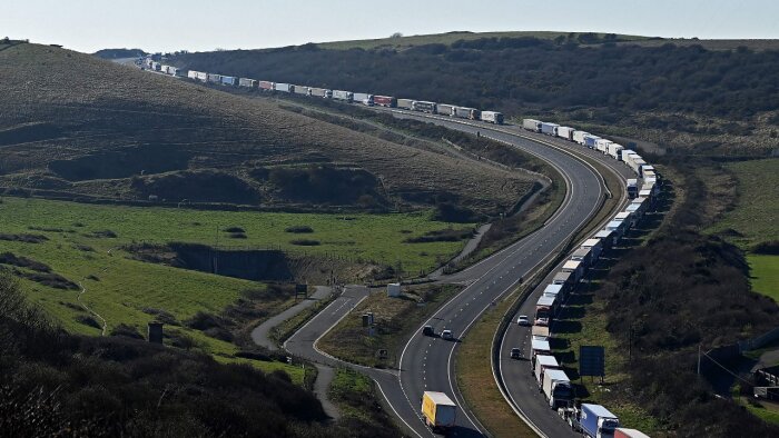 Freight lorries and HGVs (heavy goods vehicles) queue on the A20 road towards the Port of Dover on the south-east coast of England. File photo / AFP