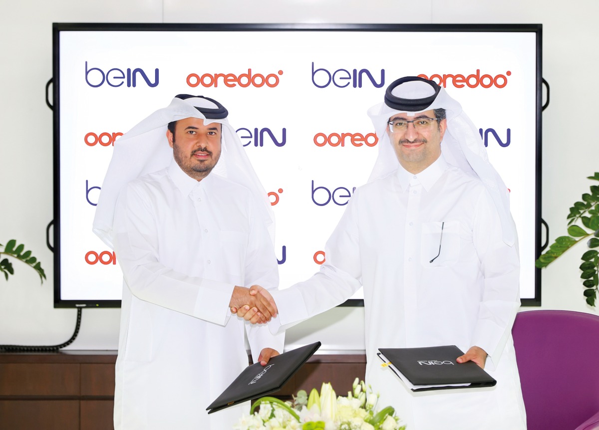 CEO Ooredoo Qatar, Sheikh Ali bin Jabor bin Mohammed Al Thani (right), and CEO of beIN MENA, Mohammad Al Subaie, at the agreement signing ceremony. 
