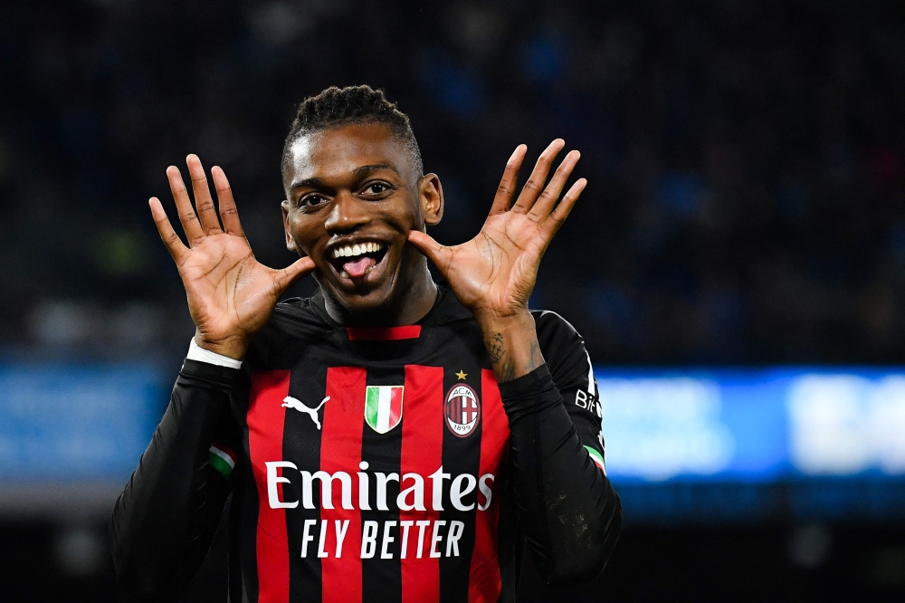 AC Milan's Portuguese forward Rafael Leao celebrates after opening the scoring during the Italian Serie A football match between SSC Napoli and AC Milan on April 2, 2023 at the Diego-Maradona stadium in Naples. (Photo by Tiziana FABI / AFP)