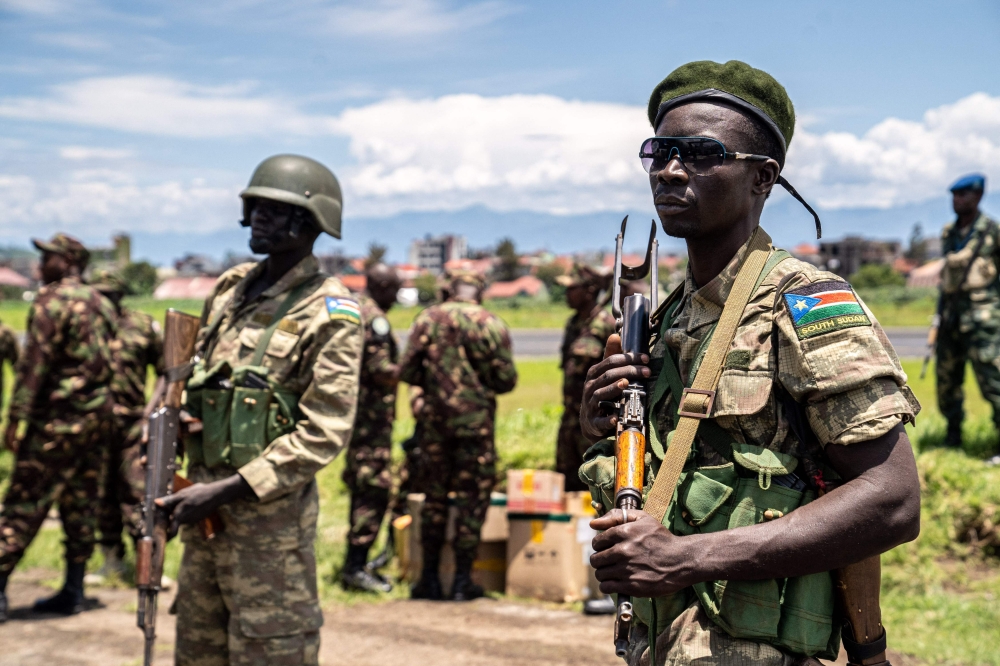 Members of the South Sudanese army at arrive for deployment at the International Airport in Goma, Eastern Democratic Republic of Congo, on April 2, 2023.(Photo by Glody MURHABAZI / AFP)