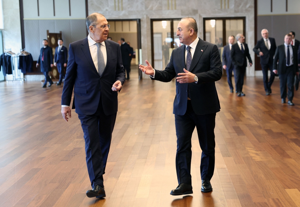 Russian Foreign Minister Sergey Lavrov (left) and Turkiye's Foreign Minister Mevlut Cavusoglu prior to their press conference at the Turkish Presidential Palace in Ankara on April 7, 2023. (Photo by Adem Altan / AFP)