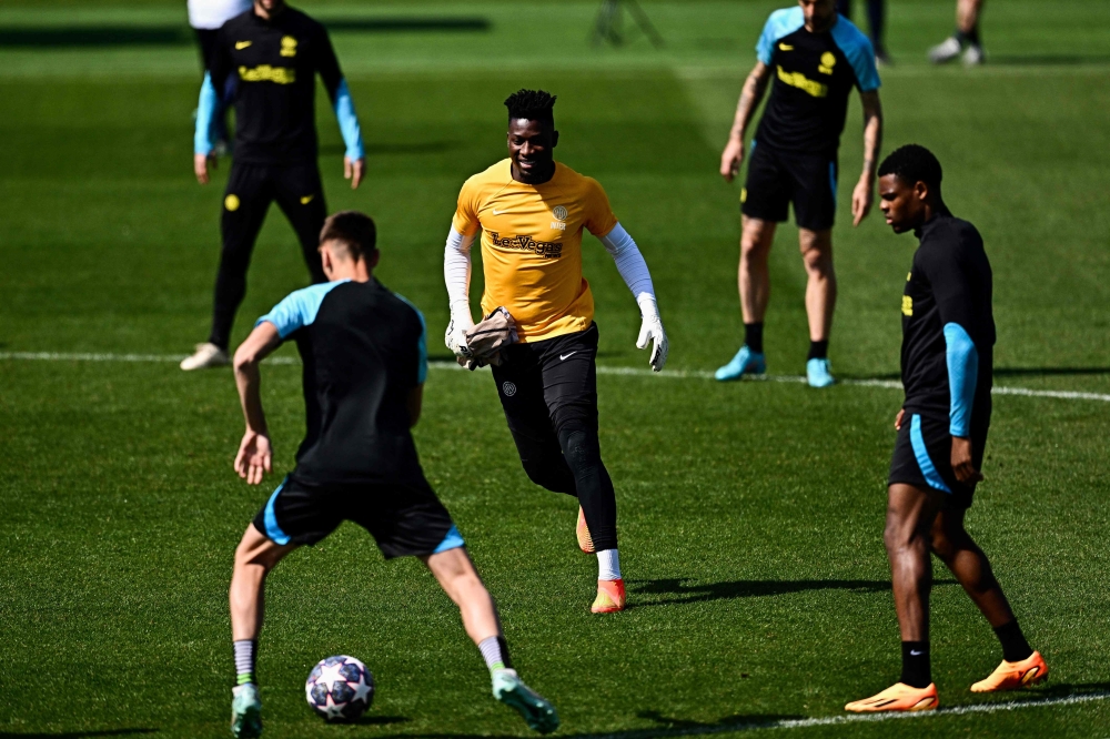 Inter Milan's Cameroonian goalkeeper Andre Onana takes part in a training session at Luz stadium in Lisbon, on April 10, 2023, ahead of the UEFA Champions League round of 8 first-leg football match against Benfica. Photo by GABRIEL BOUYS / AFP