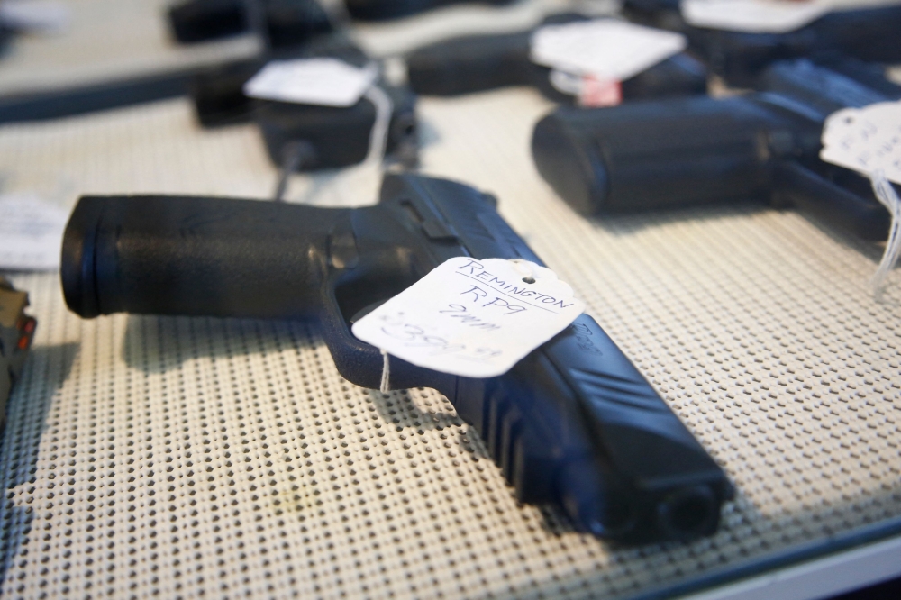 In this file photo taken on March 26, 2018 a Remington RP9 9mm pistol sits for sale at Idol's Gun Rack gun shop in Kernersville, North Carolina. (Photo by Brian Blanco / GETTY IMAGES NORTH AMERICA / AFP)
