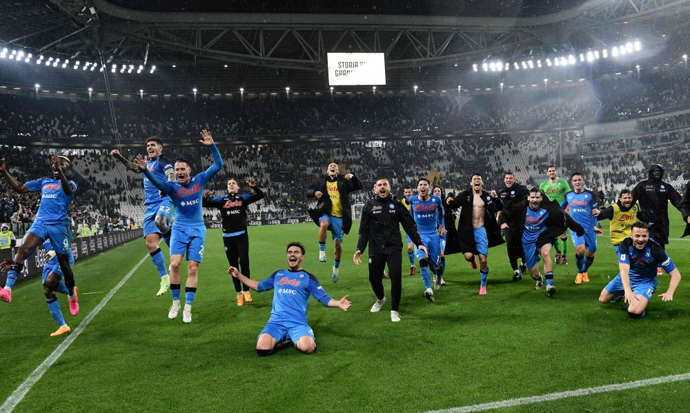 Napoli's players celebrate after winning in the Italian Serie A football match between Juventus and Napoli on April 23, 2023 at the Juventus stadium in Turin. Photo by Isabella BONOTTO / AFP