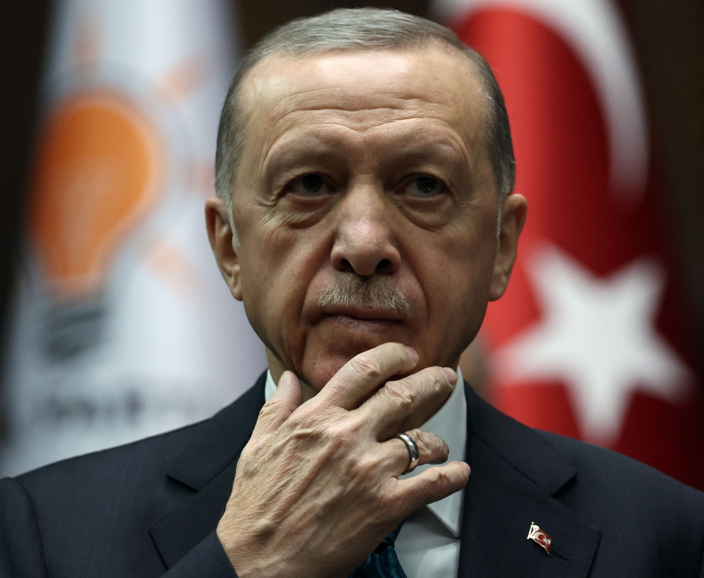Turkish President and leader of the Justice and Development Party (AK Party), Recep Tayyip Erdogan delivers a speech during his party's group meeting at the Turkish Grand National Assembly in Ankara, on March 29, 2023. (Photo by Adem Altan / AFP)