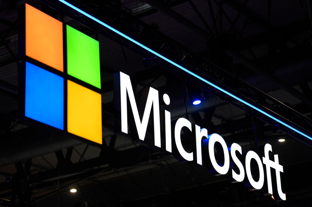 In this file photo taken on March 02, 2022 a Microsoft logo is displayed at the MWC (Mobile World Congress) in Barcelona. (Photo by Josep Lago / AFP)