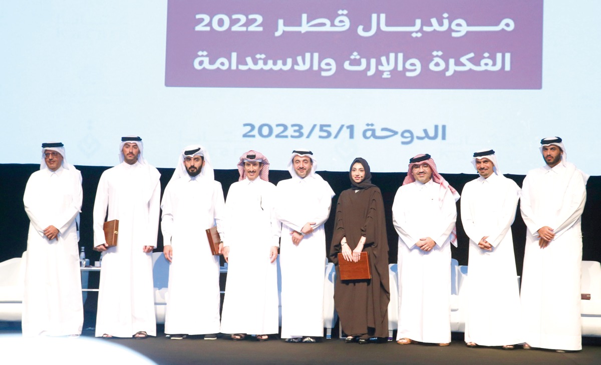Qatar Media Corporation CEO H E Sheikh Abdulaziz bin Thani Al Thani (centre); Qatar Press Centre  President Saad bin Mohammed Al Rumaihi (fourth left); and other officials and dignitaries at the seminar on Qatar 2022 legacy, held at Katara yesterday. Pic: Rajan Vadakkemuriyil 