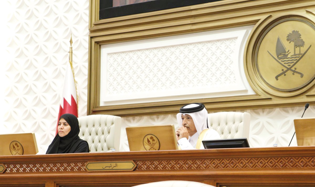 Speaker of the Shura Council H E Hassan bin Abdullah Al Ghanim (right) chairing the meeting yesterday.