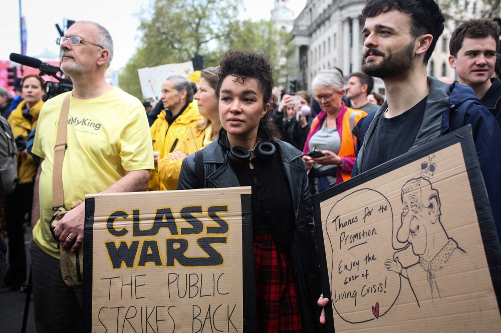 Members of the anti-monarchist group Republic stage a protest in Trafalgar Squar on May 6, 2023. (Photo by Susannah Ireland / AFP)