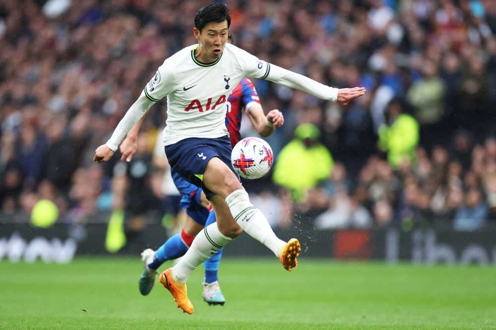 Tottenham Hotspur's South Korean striker Son Heung-Min runs with the ball during the English Premier League football match between Tottenham Hotspur and Crystal Palace at Tottenham Hotspur Stadium in London, on May 6, 2023. Photo by ISABEL INFANTES / AFP
