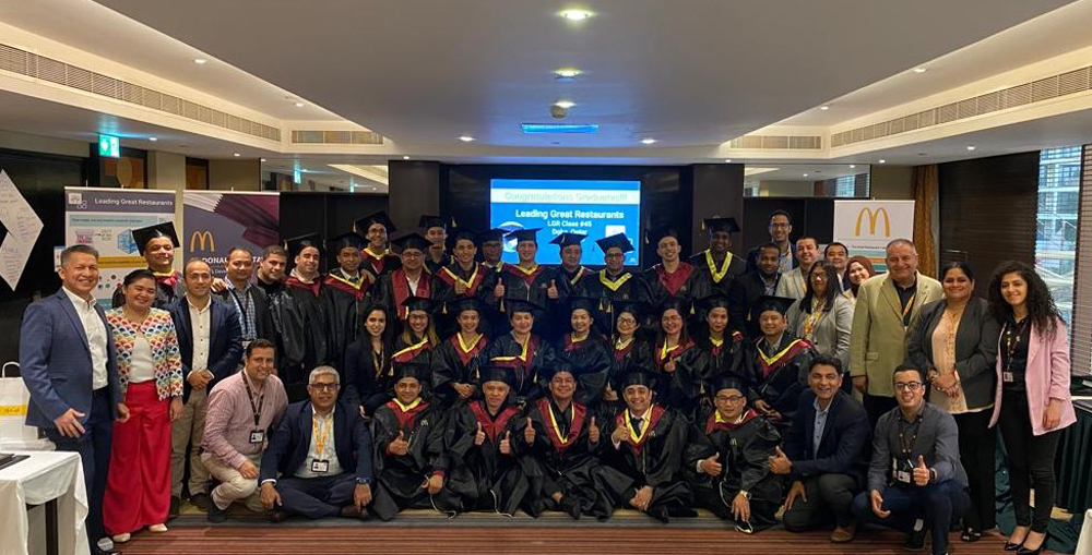 McDonald’s employees and officials at the completion ceremony of  ‘Leading Great Restaurants’ training course.