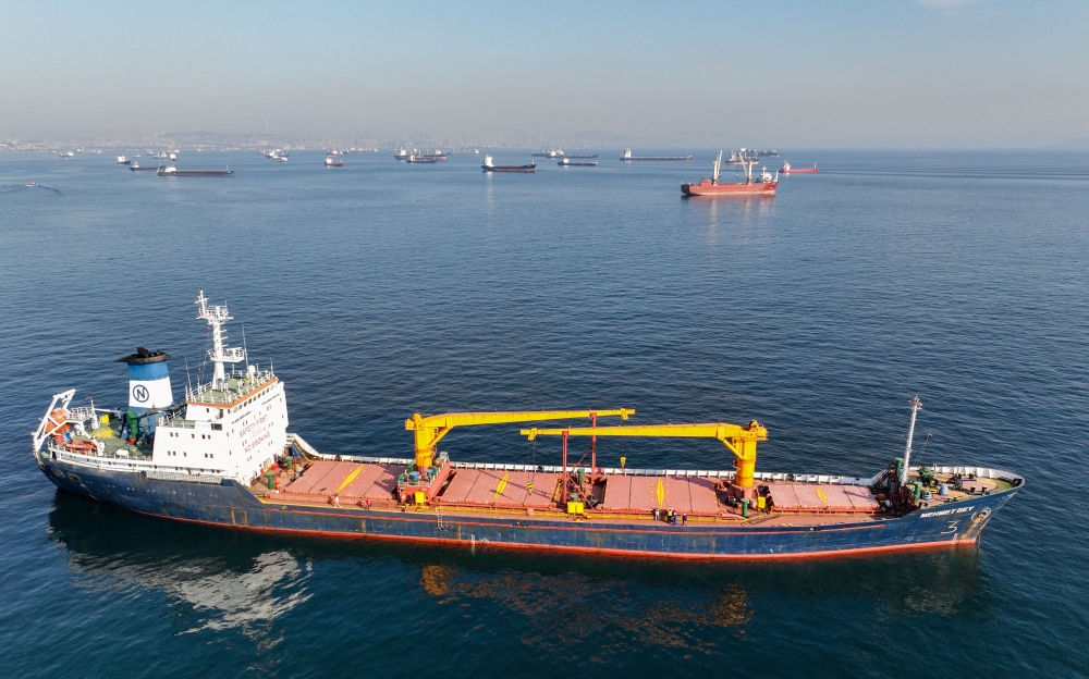 File Photo: The Joint Coordination Centre officials board cargo ship Mehmet Bey as she waits to pass the Bosphorus strait off the shores of Yenikapi during a misty morning in Istanbul, Turkey, on October 31, 2022. (Mehmet Emin Calsikan/Reuters)