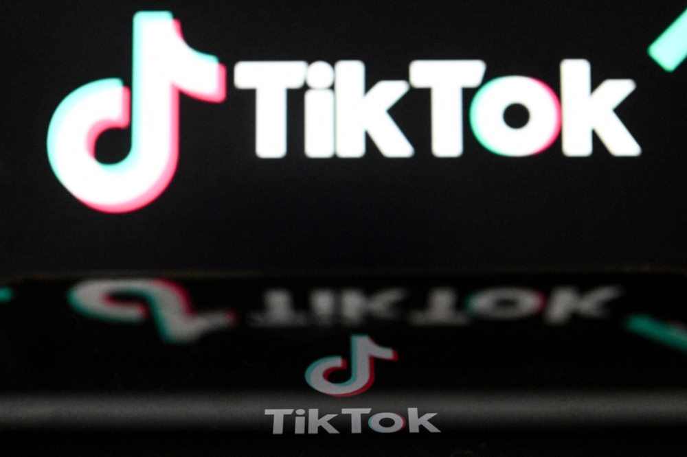 This illustration picture taken in Moscow on March 24, 2023, shows the Chinese social networking service TikTok's logo on a smartphone screen. (Photo by Kirill KUDRYAVTSEV / AFP)
