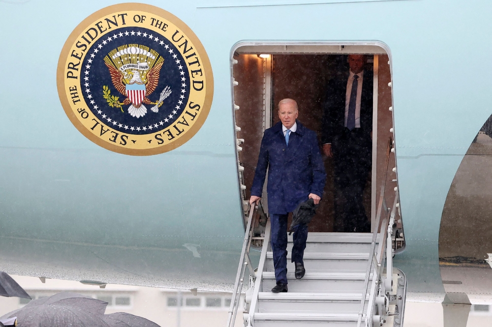 US President Joe Biden disembarks Air Force One upon his arrival at the US Marine Corps base in Iwakuni on May 18, 2023, ahead of the G7 Leaders' Summit in Hiroshima. (Photo by JIJI Press / AFP)